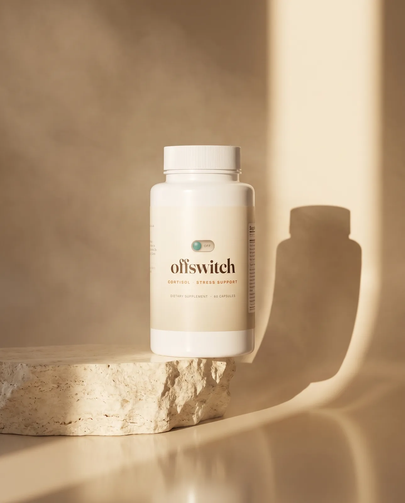 Offswitch bottle on a cream marble surface