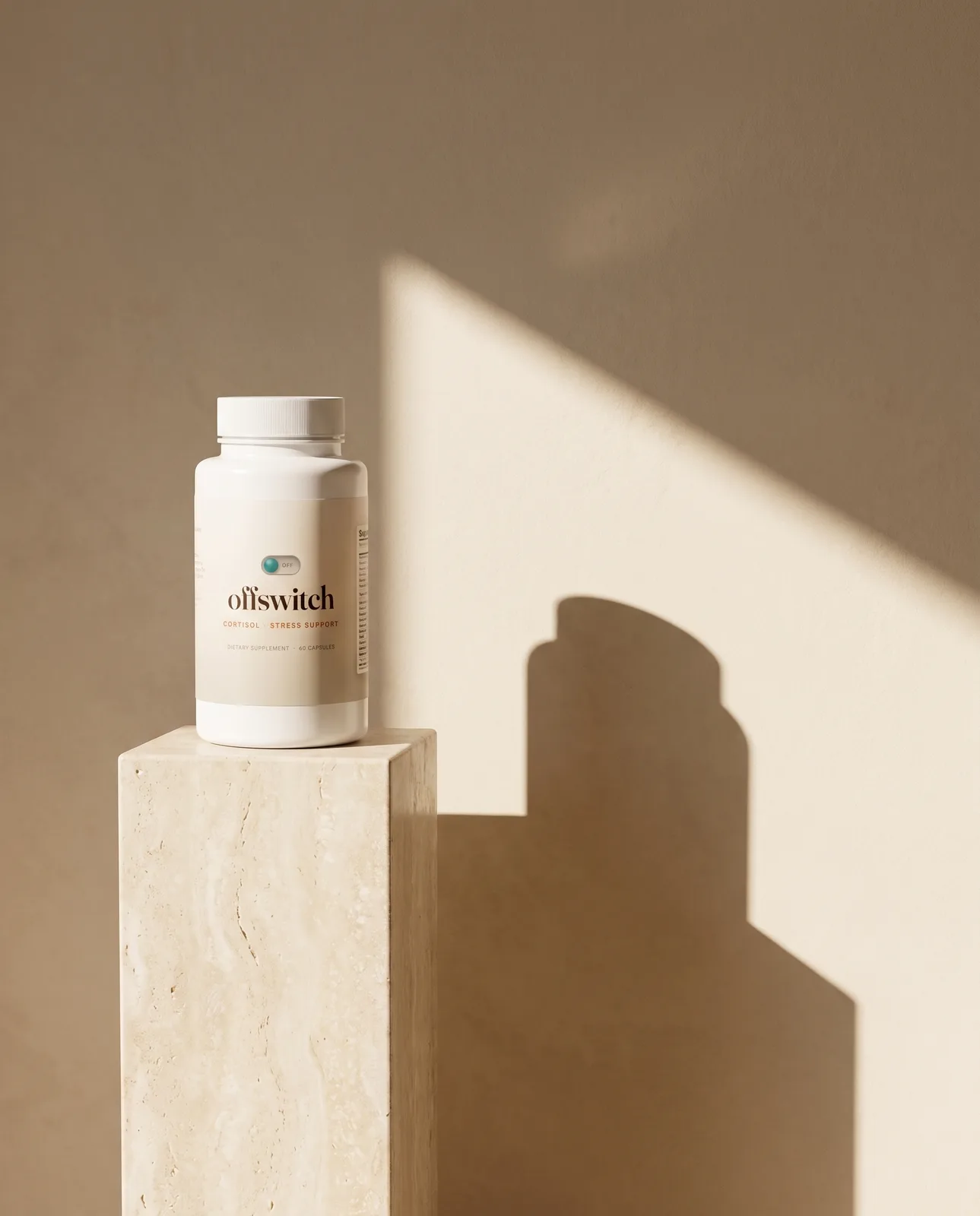 Offswitch bottle beside a marble ledge
